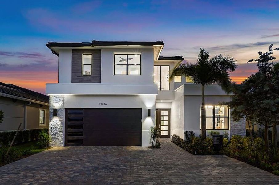 Front exterior of a new home in , Palm Beach Gardens, FL, highlighting curb appeal (Image 23).