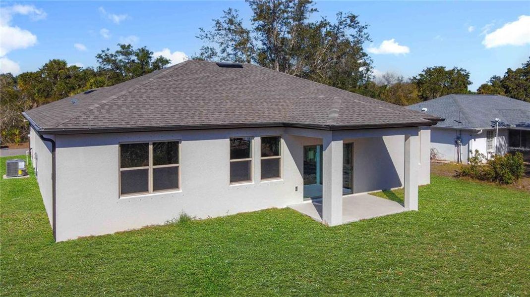 Exterior details and patio area of a home in , North Port (Image 22).