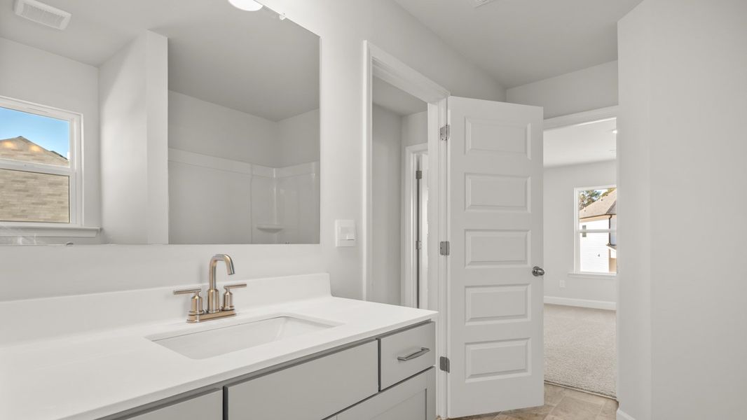 Representative furnished interior of a home built from the Packard by D.R. Horton in Evergreen Crossing, Locust Grove (Image 12).