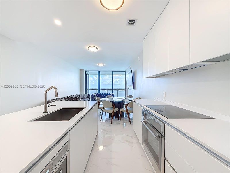 Furnished interior view inside a new home in , Miami (Image 13).