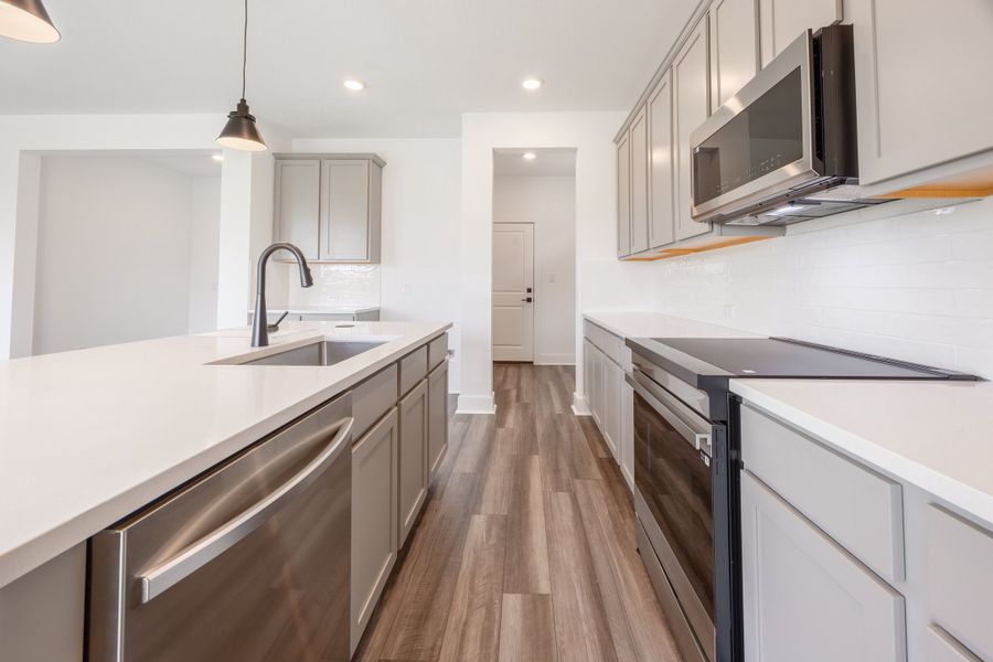 Furnished interior view inside a new home in Sage Collection – Freedom at Anthem, Kyle (Image 3).