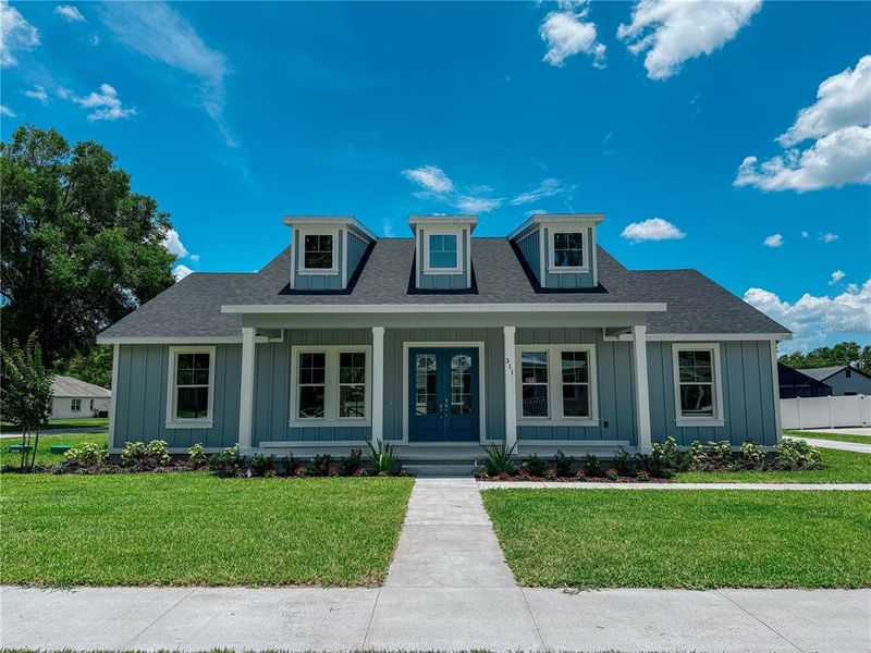 Front exterior of a new home in , Lake Helen, FL, highlighting curb appeal (Image 32). Front exterior of a new home in , Lake Helen, FL, highlighting curb appeal (Image 32).