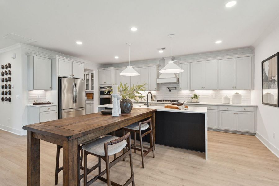 Furnished interior view inside a new home in Tidewater at Lakes of Cane Bay, Summerville (Image 6).