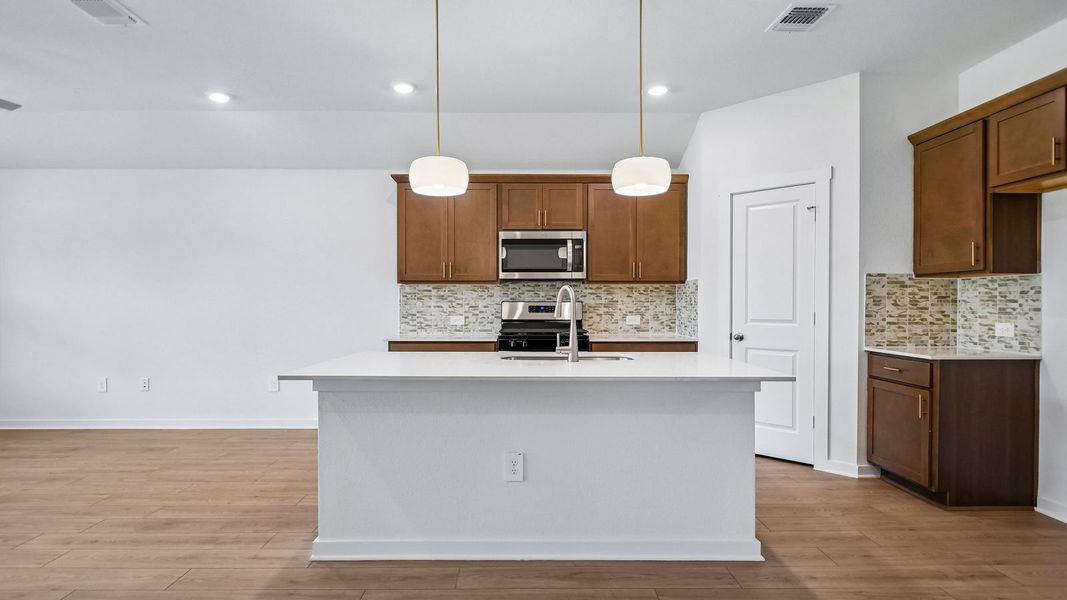 Furnished interior view inside a new home in Trails at Wildhorse, Austin (Image 6).
