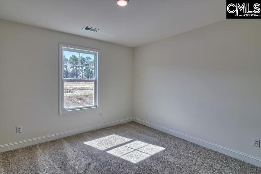 Spacious, unfurnished interior of a new home in Cottages at Roofs Pond, West Columbia (Image 41).