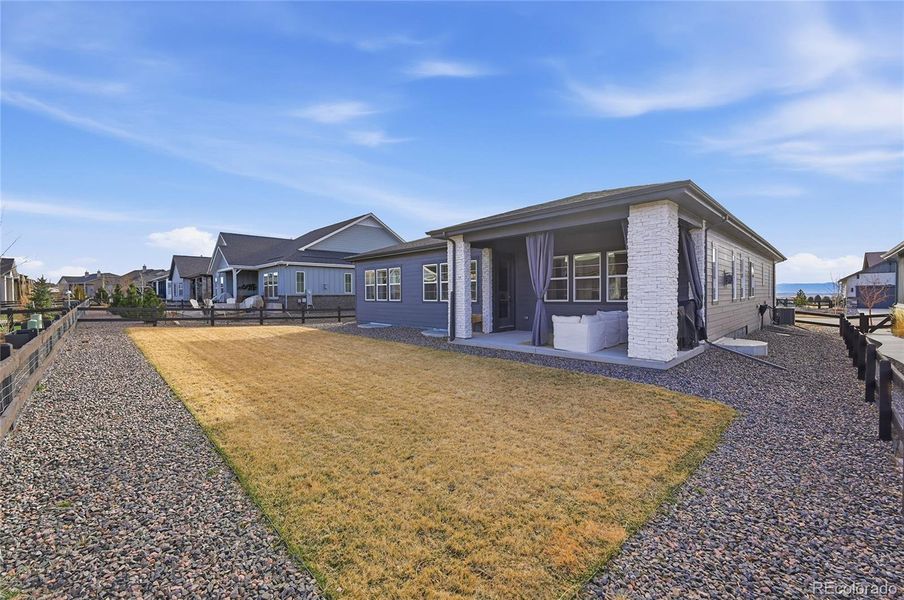 Exterior details and patio area of a home in Hilltop at Inspiration, Aurora (Image 20).