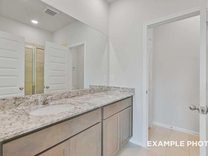 Furnished interior view inside a new home in Caney Creek Place, Conroe (Image 13).