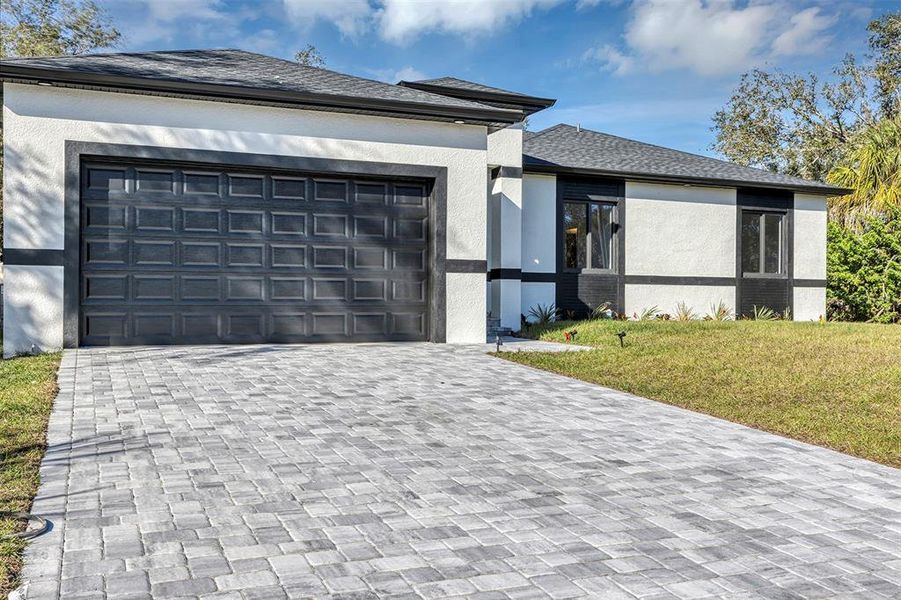 Front exterior of a new home in , Port Charlotte, FL, highlighting curb appeal (Image 29).
