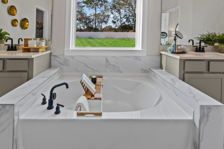 Furnished interior view inside a new home in The Cypress Series at Reserve East, Flagler Beach (Image 10).