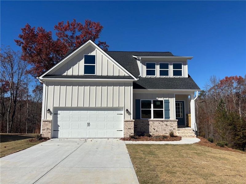 Front exterior of a new home in , Gainesville, GA, highlighting curb appeal (Image 1).