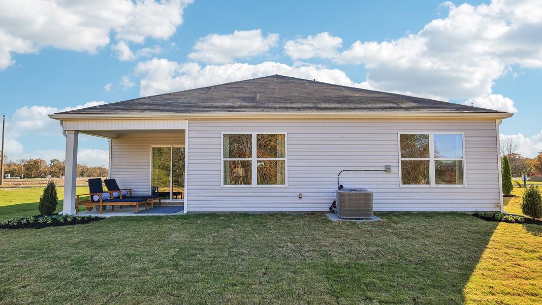Exterior details and patio area of a home in Villages of Hunters Point, Lebanon (Image 3).