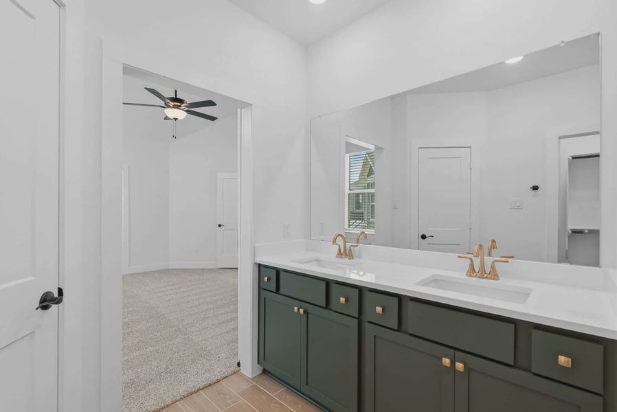 Representative furnished interior of a home built from the Dillon by Chesmar Homes in Sienna Courtyard, Missouri City (Image 11).