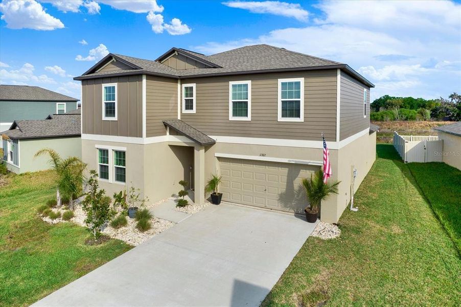 Front exterior of a new home in Mirada, San Antonio, FL, highlighting curb appeal (Image 23).