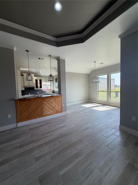 Another view of living area, diningroom and kitchen