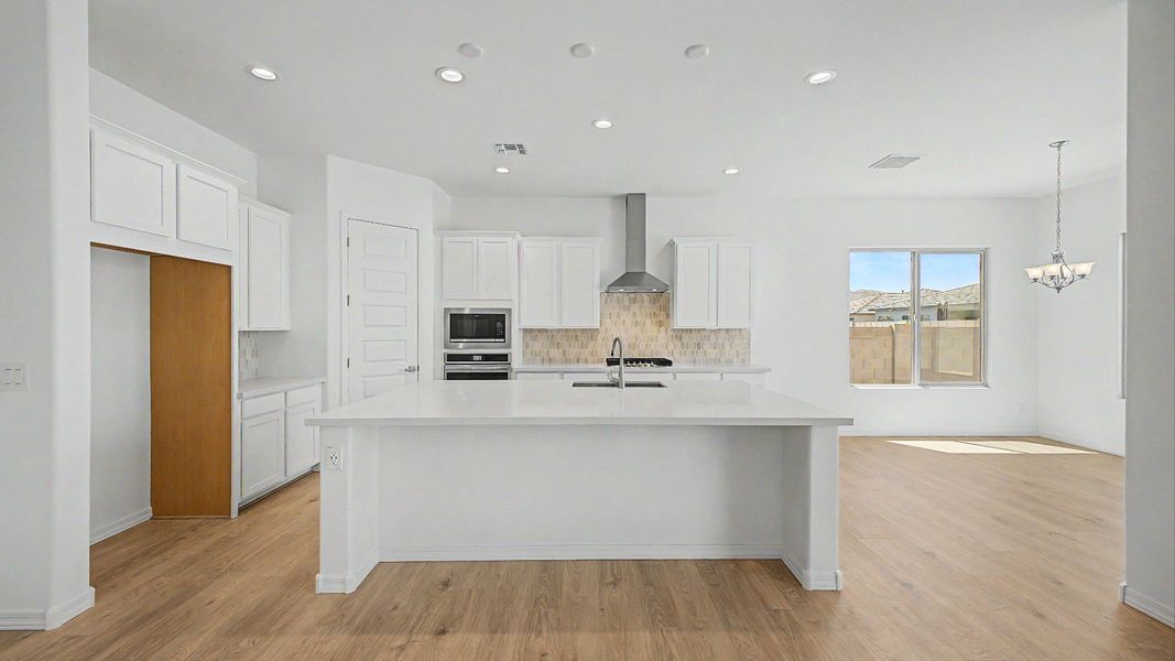 Furnished interior view inside a new home in Windrose, Waddell (Image 6).