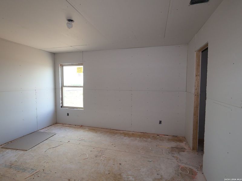 In-progress construction of a new home in Hickory Ridge, Elmendorf, TX (Image 18).