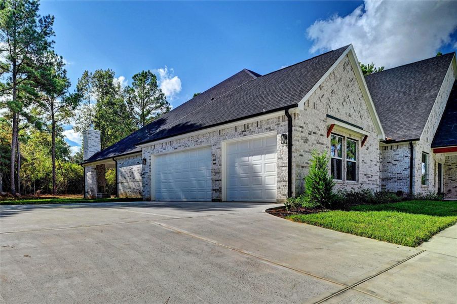 Front exterior of a new home in , Montgomery, TX, highlighting curb appeal (Image 25).