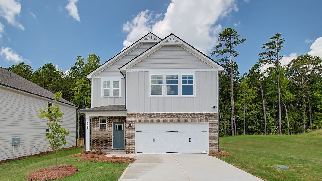 Representative exterior photo of a completed home built from the Zoey II by DRB Homes in Enclave at Evergreen, Fairburn, GA (Image 21).