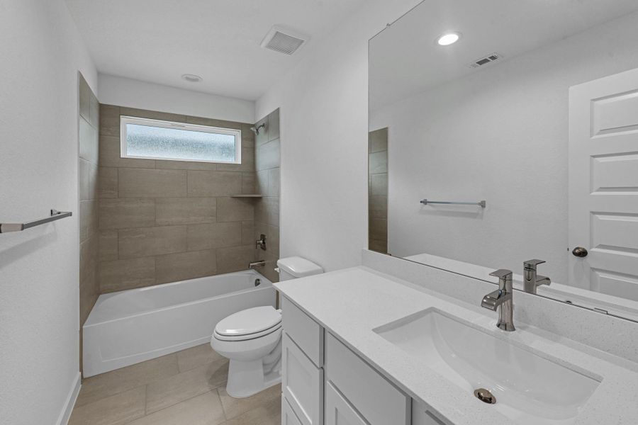 Furnished interior view inside a new home in Grand Mason Crossing, Park Row (Image 11).