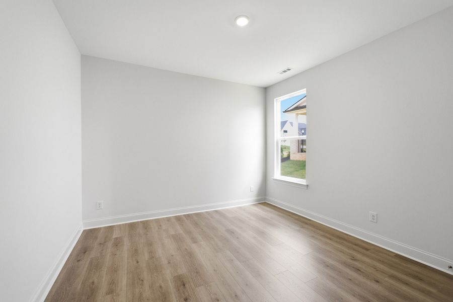 Spacious, unfurnished interior of a new home in Dorris Farm, White House (Image 26).