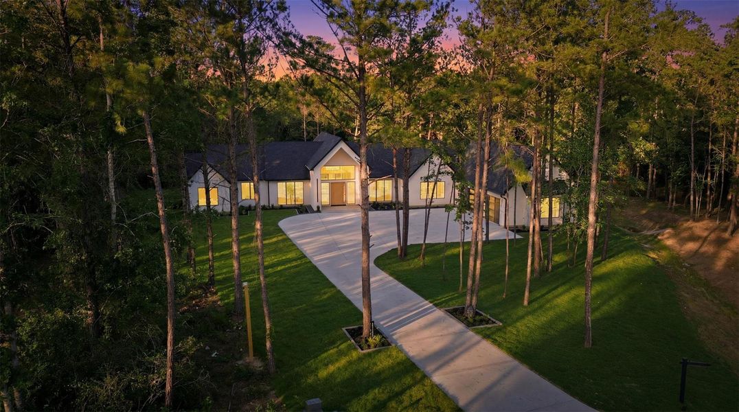Front exterior of a new home in , Montgomery, TX, highlighting curb appeal (Image 25).