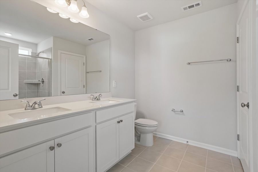 Furnished interior view inside a new home in Cambridge Reserve, Angier (Image 8).