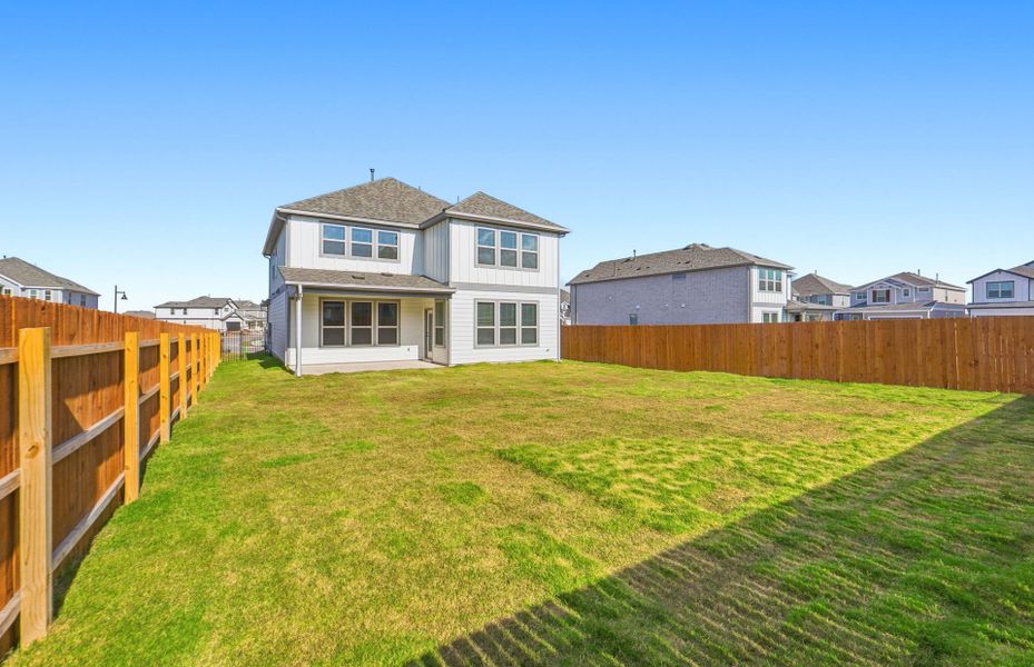 Exterior details and patio area of a home in Santa Rita Ranch, Liberty Hill (Image 28). Exterior details and patio area of a home in Santa Rita Ranch, Liberty Hill (Image 28).