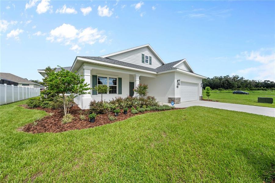 Front exterior of a new home in , Ocala, FL, highlighting curb appeal (Image 26).