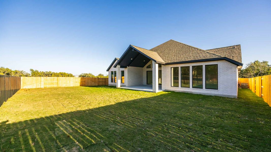 Exterior details and patio area of a home in Parkside On The River West 70'/80', Georgetown (Image 3).