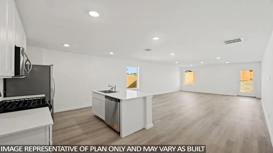 Furnished interior view inside a new home in Sunterra, Katy (Image 3).