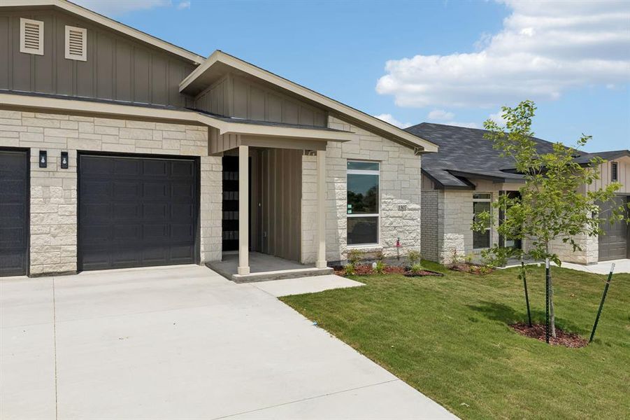 Front exterior of a new home in , Killeen, TX, highlighting curb appeal (Image 19).