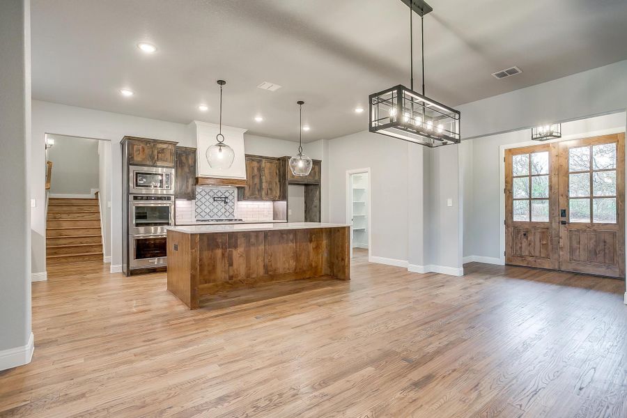 Representative furnished interior of a home built from the Pecan Grove by Trinity Classic Homes in The Reserve at Shadle, Poolville (Image 14). Representative furnished interior of a home built from the Pecan Grove by Trinity Classic Homes in The Reserve at Shadle, Poolville (Image 14).