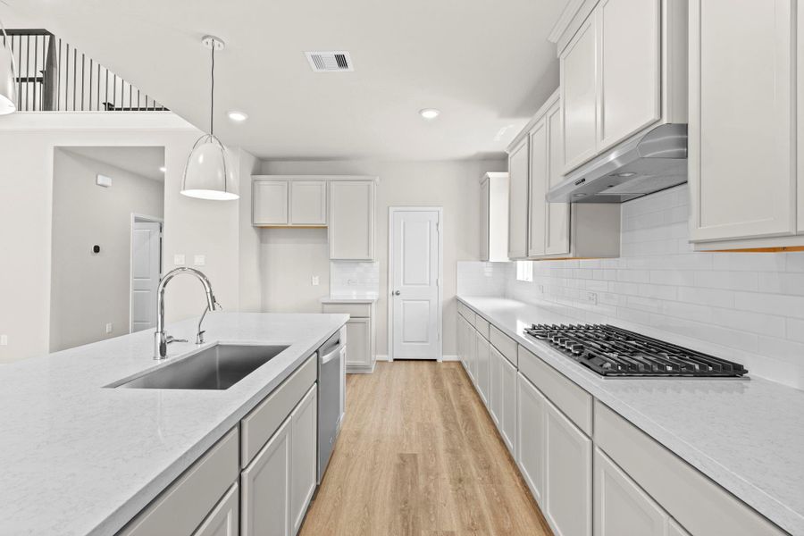 Furnished interior view inside a new home in Bridgeland, Cypress (Image 15).