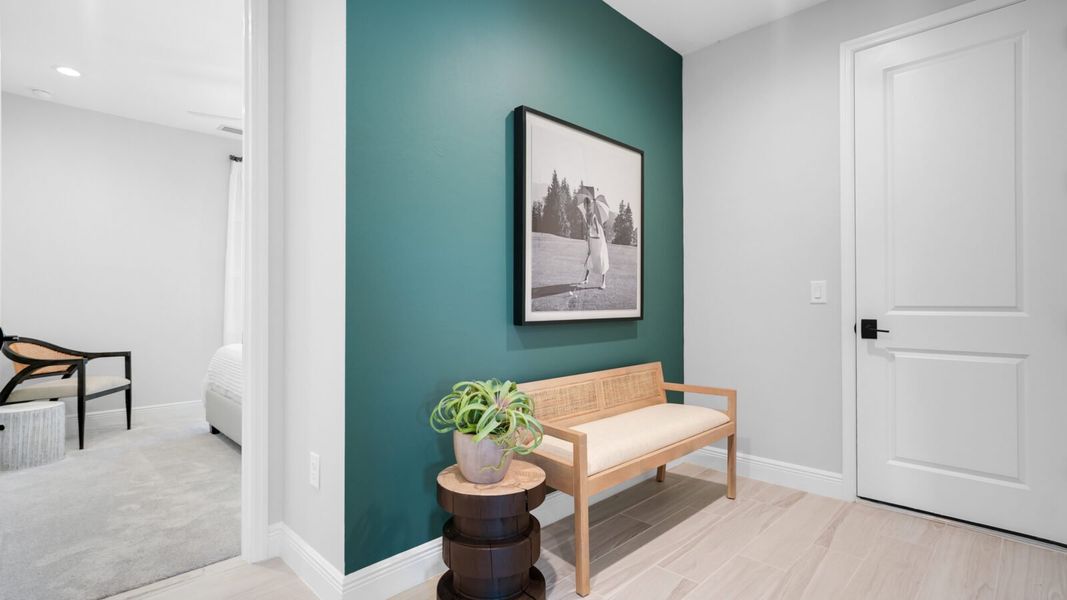 Representative furnished interior of a home built from the Meadow Brook by Neal Communities in SkySail, Naples (Image 17).