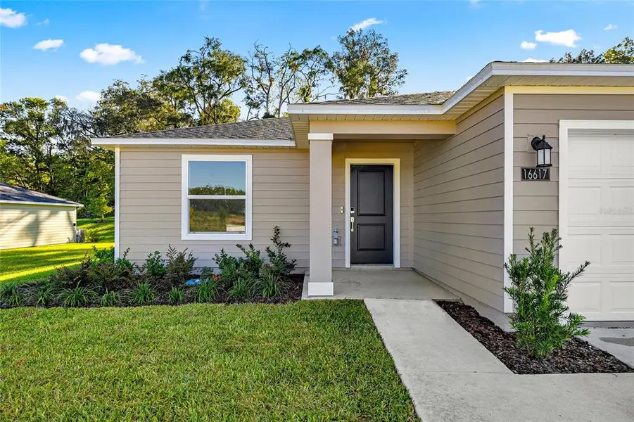 Exterior details and patio area of a home in Marion Ranch, Ocala (Image 4).