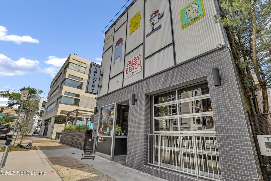 Front exterior of a new home in , Jacksonville, FL, highlighting curb appeal (Image 2).
