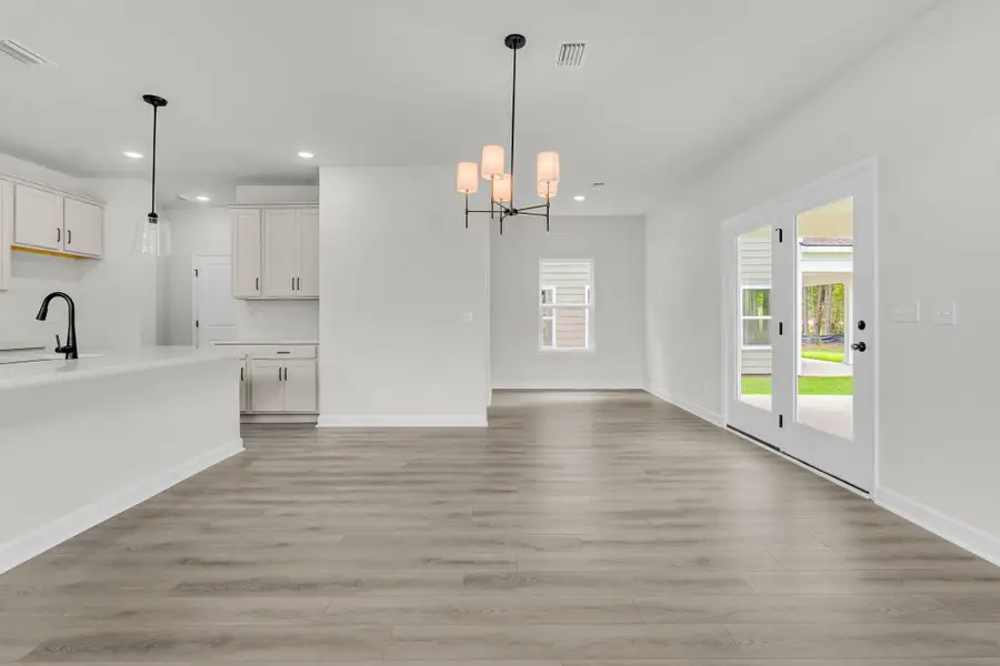 Spacious, unfurnished interior of a new home in , Ravenel (Image 15). Spacious, unfurnished interior of a new home in , Ravenel (Image 15).