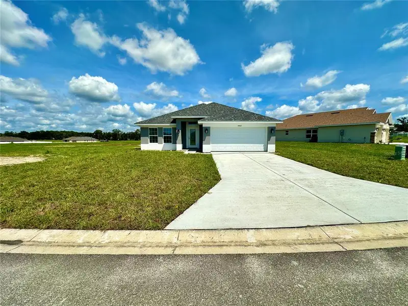 Front exterior of a new home in , Ocala, FL, highlighting curb appeal (Image 4).