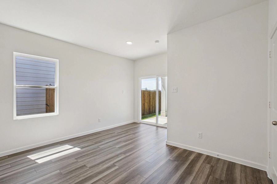 Representative unfurnished interior of a home built from the Odyssey by Starlight Homes in Oakfield Lakes, Parrish (Image 13).
