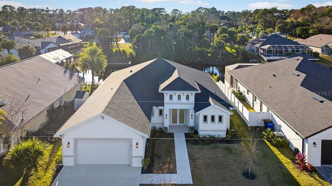 Front exterior of a new home in , Palm Coast, FL, highlighting curb appeal (Image 28).