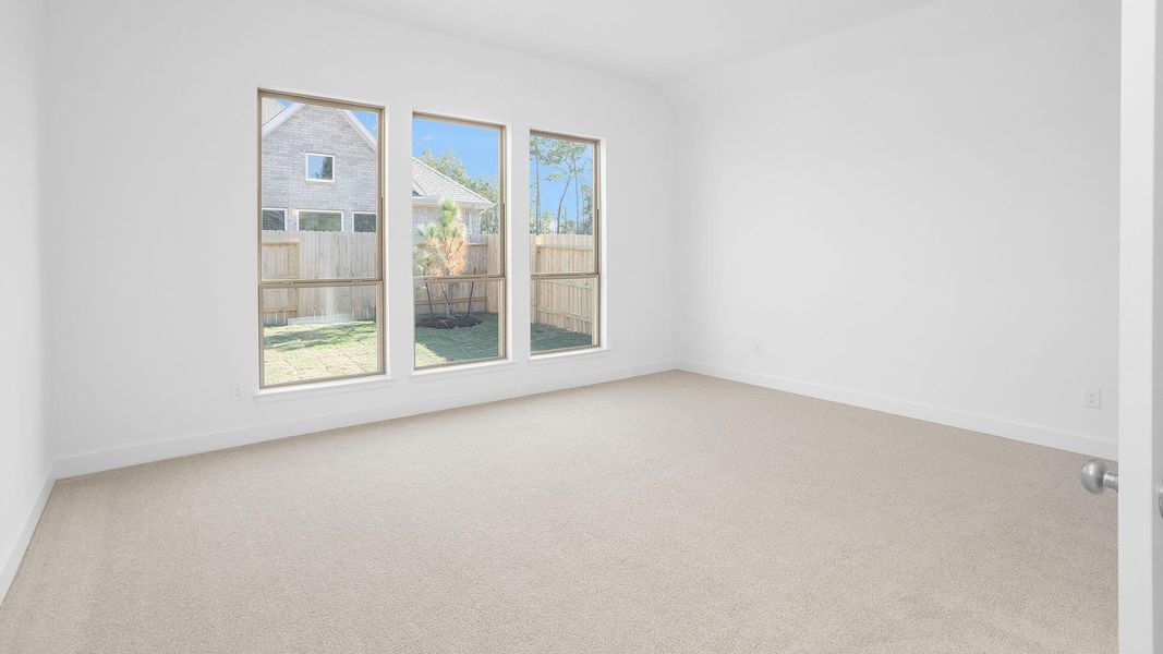 Spacious, unfurnished interior of a new home in Artavia 45', Conroe (Image 11).