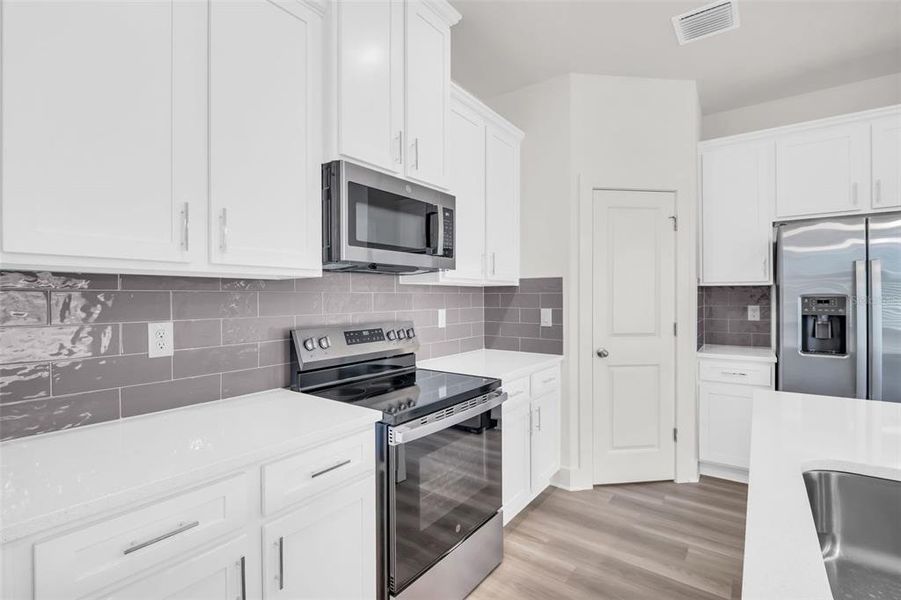 Furnished interior view inside a new home in Emerald Fields, Hudson (Image 8).