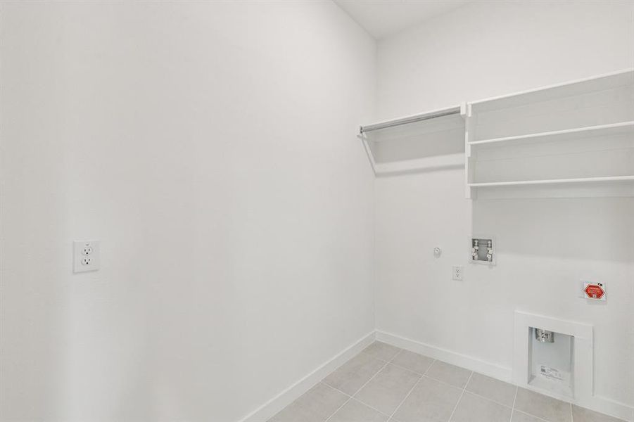 Utility Room in the Da Vinci II home plan by Trophy Signature Homes – REPRESENTATIVE PHOTO Utility Room in the Da Vinci II home plan by Trophy Signature Homes – REPRESENTATIVE PHOTO