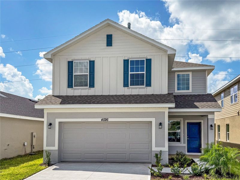 Front exterior of a new home in Harmony Central, St. Cloud, FL, highlighting curb appeal (Image 1). Front exterior of a new home in Harmony Central, St. Cloud, FL, highlighting curb appeal (Image 1).