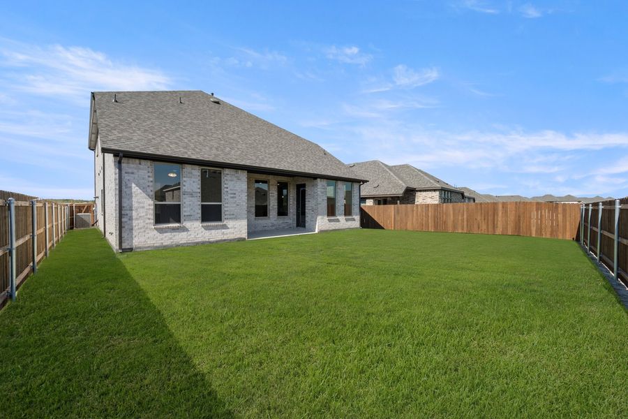 Exterior details and patio area of a home in The Oaks, Red Oak (Image 4). Exterior details and patio area of a home in The Oaks, Red Oak (Image 4).