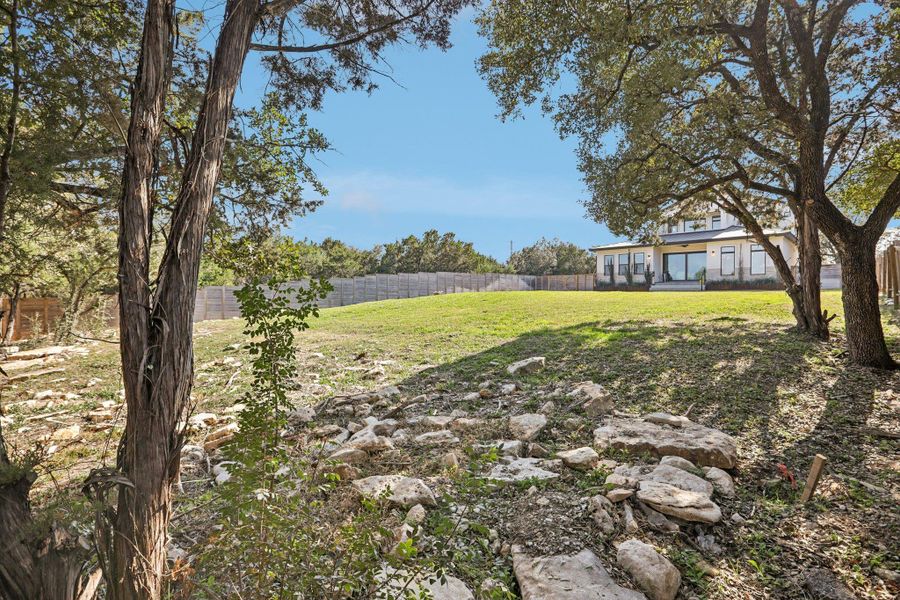 View of fenced backyard