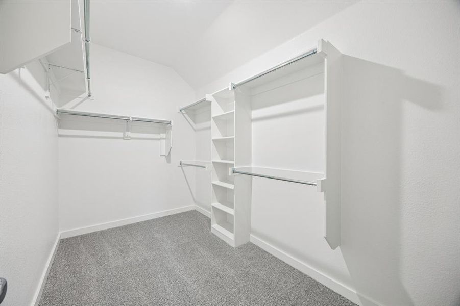 Primary Closet in the Oscar home plan by Trophy Signature Homes – REPRESENTATIVE PHOTO Primary Closet in the Oscar home plan by Trophy Signature Homes – REPRESENTATIVE PHOTO