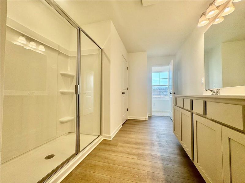 Furnished interior view inside a new home in Eastlyn Crossing, Flowery Branch (Image 8).