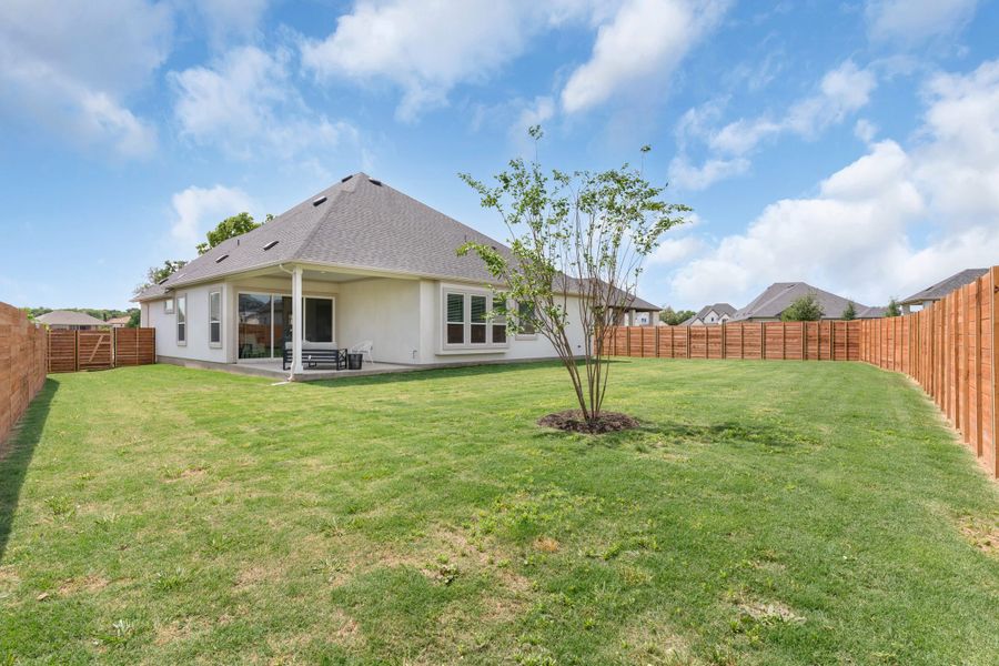 Exterior details and patio area of a home in Broken Oak, Georgetown (Image 44).