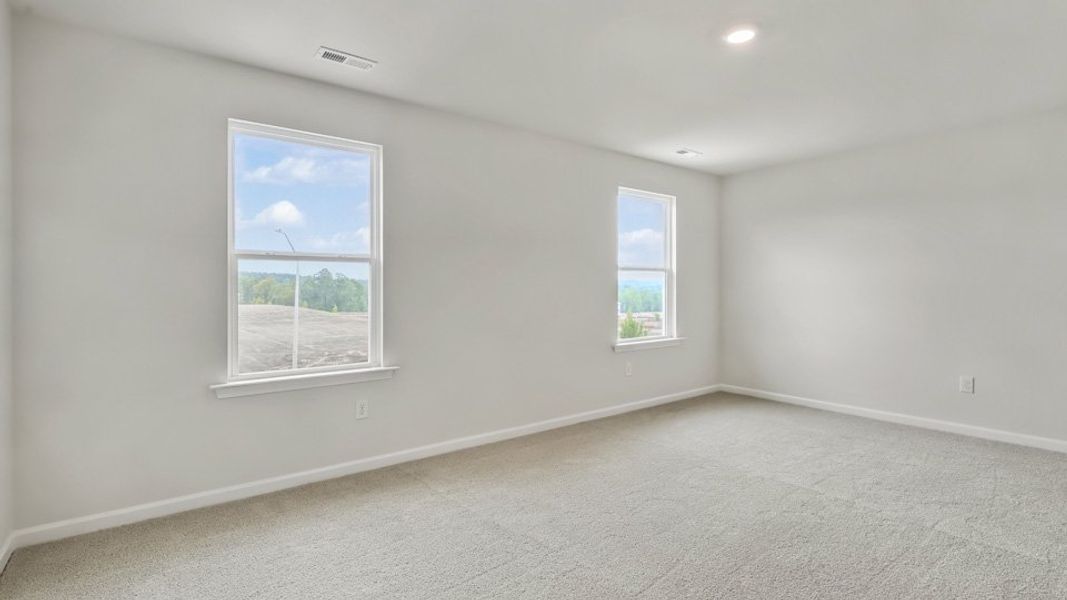 Representative unfurnished interior of a home built from the Robie by D.R. Horton in The Grove at Matthews Landing, Fuquay Varina (Image 23).
